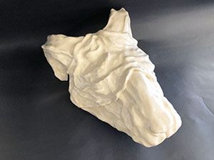 Image of Shannon Brown's ceramic sculpture, Blindfolded Sheep.